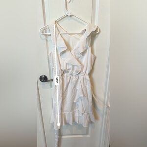 Emmalee’s white front ruffle dress
